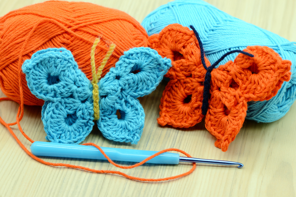 Blue crochet butterflies and crochet hook aside.